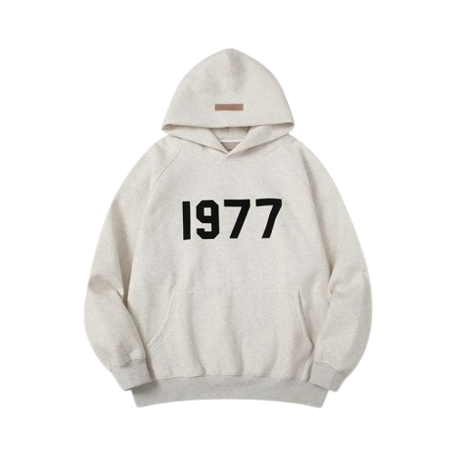 Essentials Hoodie in grey with '1977' graphic, featuring a comfortable fit, soft fabric, and minimalist design for a trendy, casual streetwear style.