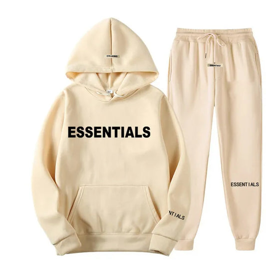 Essentials Cream Track Suit in beige, offering a comfortable and stylish fit for casual wear with a minimalist design.