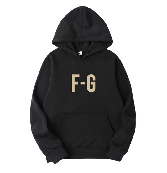 Black FG Essentials Hoodie, showcasing bold 'FG' branding, premium fabric, and a comfortable fit for a sleek and modern streetwear look.