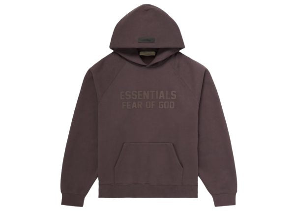 Essentials Hoodie tag in matching plum color, showcasing the minimalist branding and premium stitching detail.