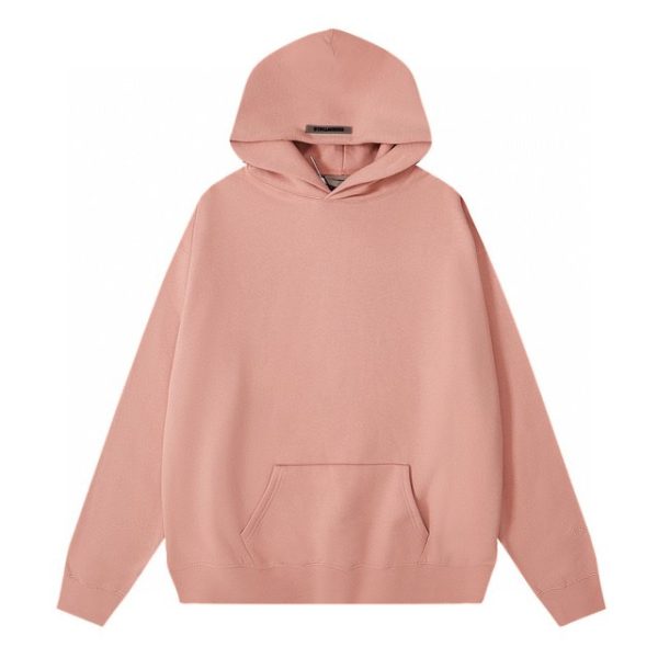 Front Fear of God Essentials Classic Fleece Reflective Pink Hoodie, featuring soft fleece fabric, reflective detailing, and a relaxed fit for a stylish and cozy streetwear look.